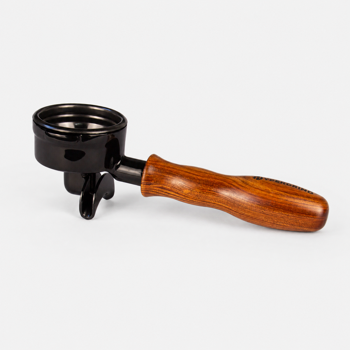 A professional espresso portafilter with a glossy black metal body and a contoured wooden handle with a warm brown finish, shown on a light gray background.